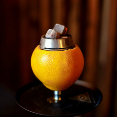 Кальян на чаші з апельсину